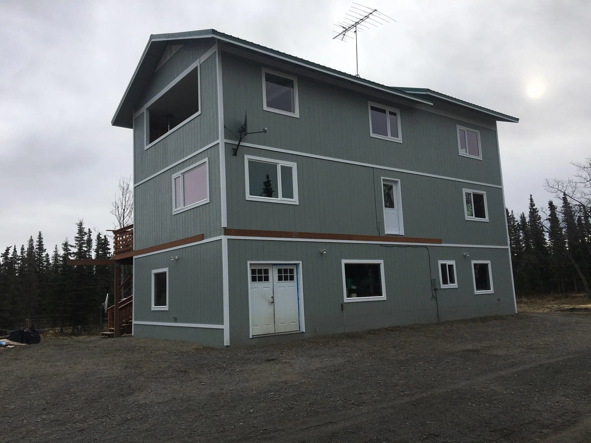 The Adkins Project — Pre-Renovation Weathered Siding (Before)