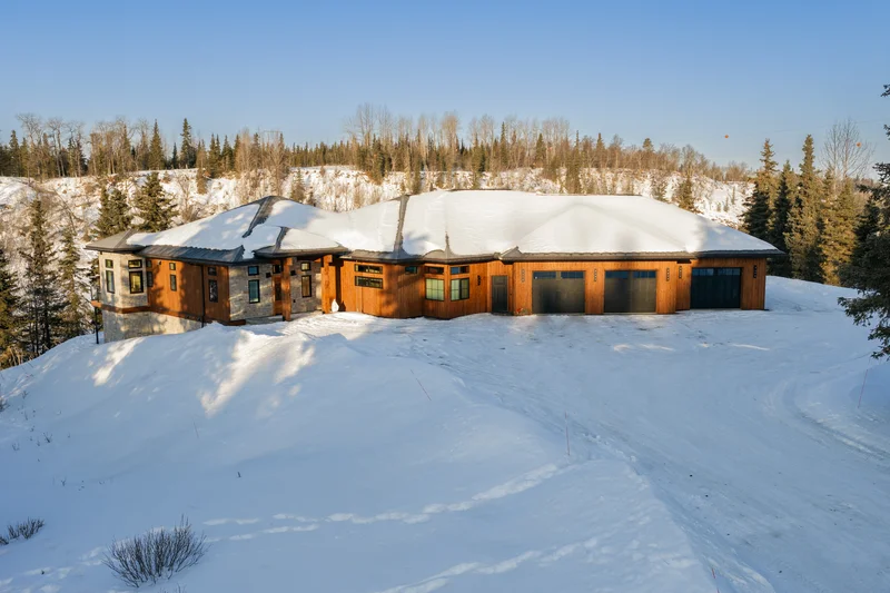 Kenai River Timber Estate — Elevated Timber Roofline & Dormer Windows