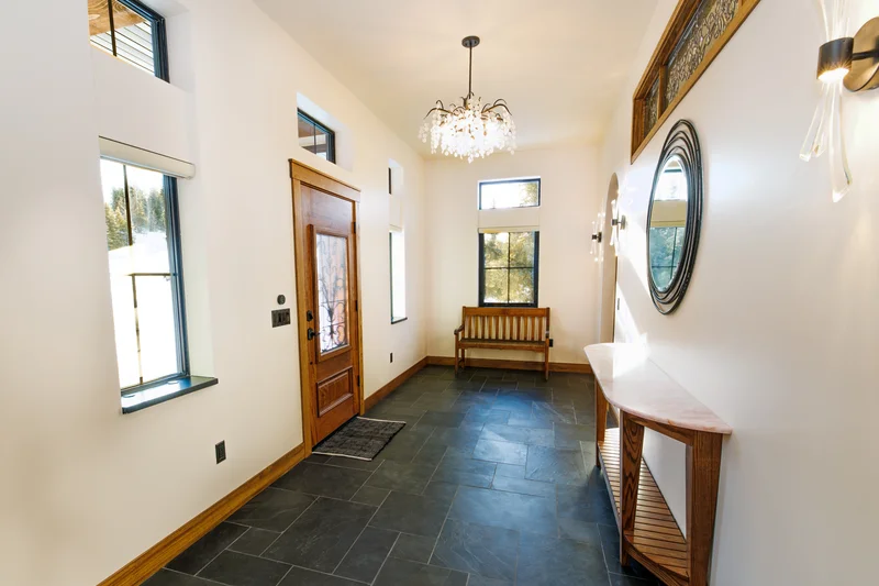 Kenai River Timber Estate — Wide Timber Gallery Hallway & Open Transition