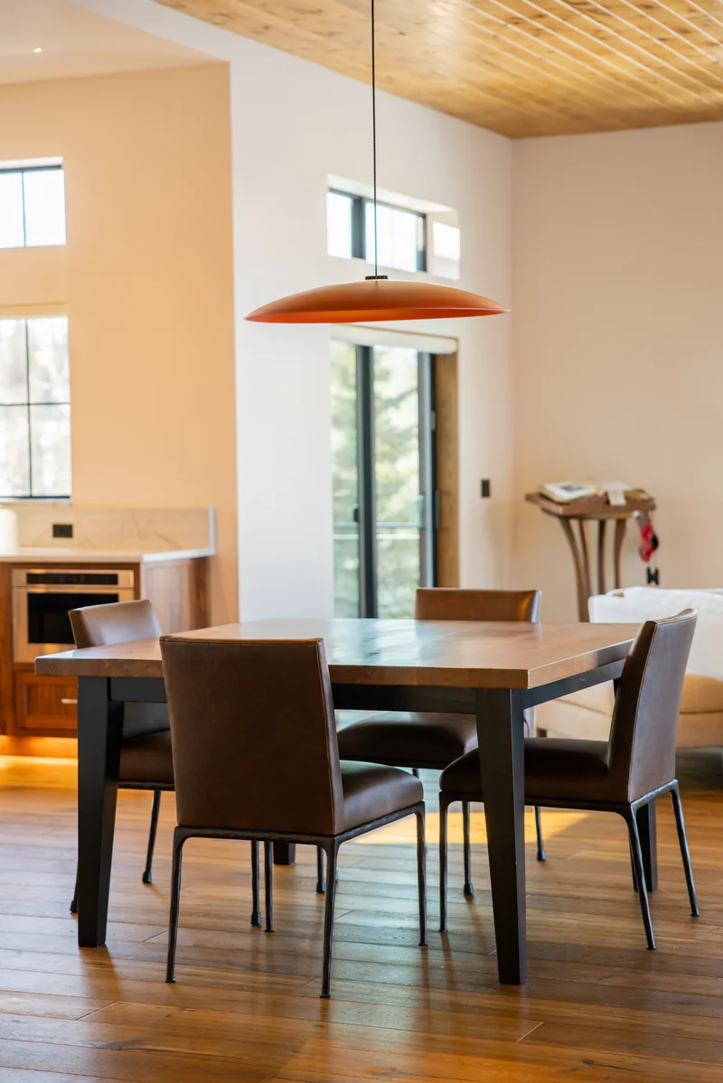 Kenai River Timber Estate — Custom Hardwood Dining Suite & River View Windows