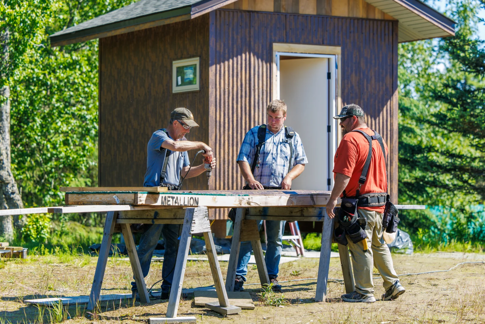 S.Hines craftsmen working on custom timber framing on site