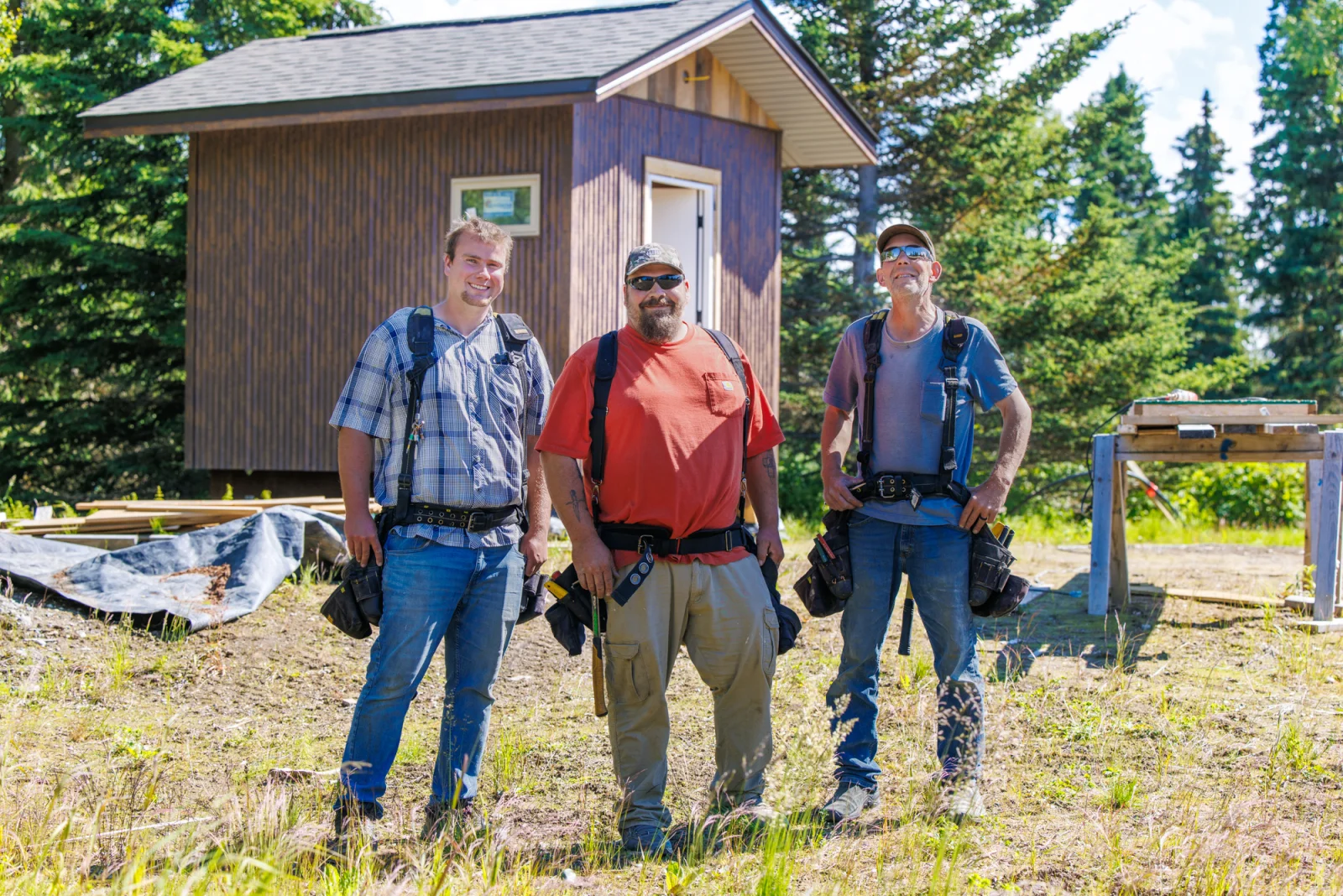 S.Hines crew members with toolbelts on job site